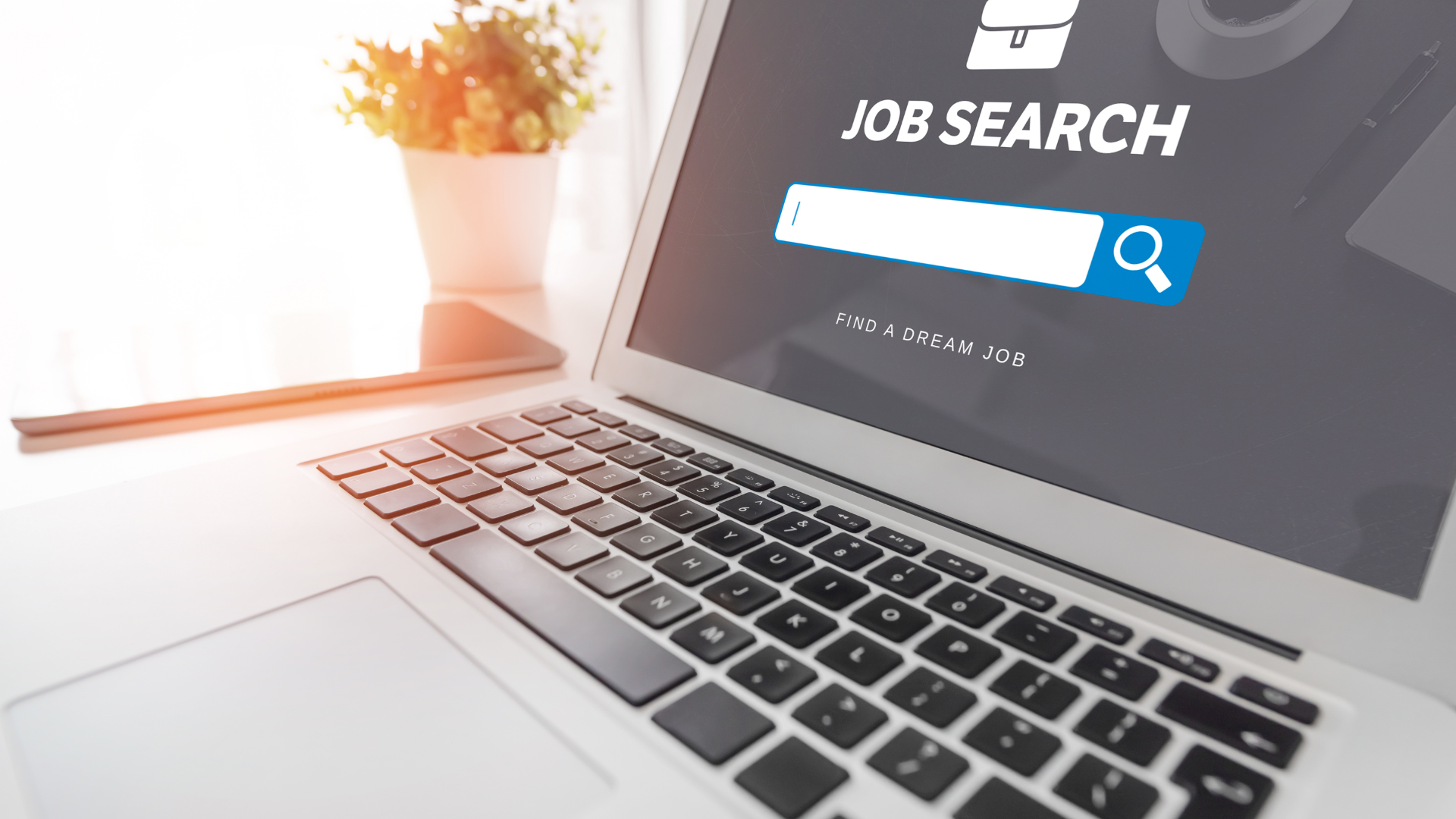 Open Laptop with a job search browser open